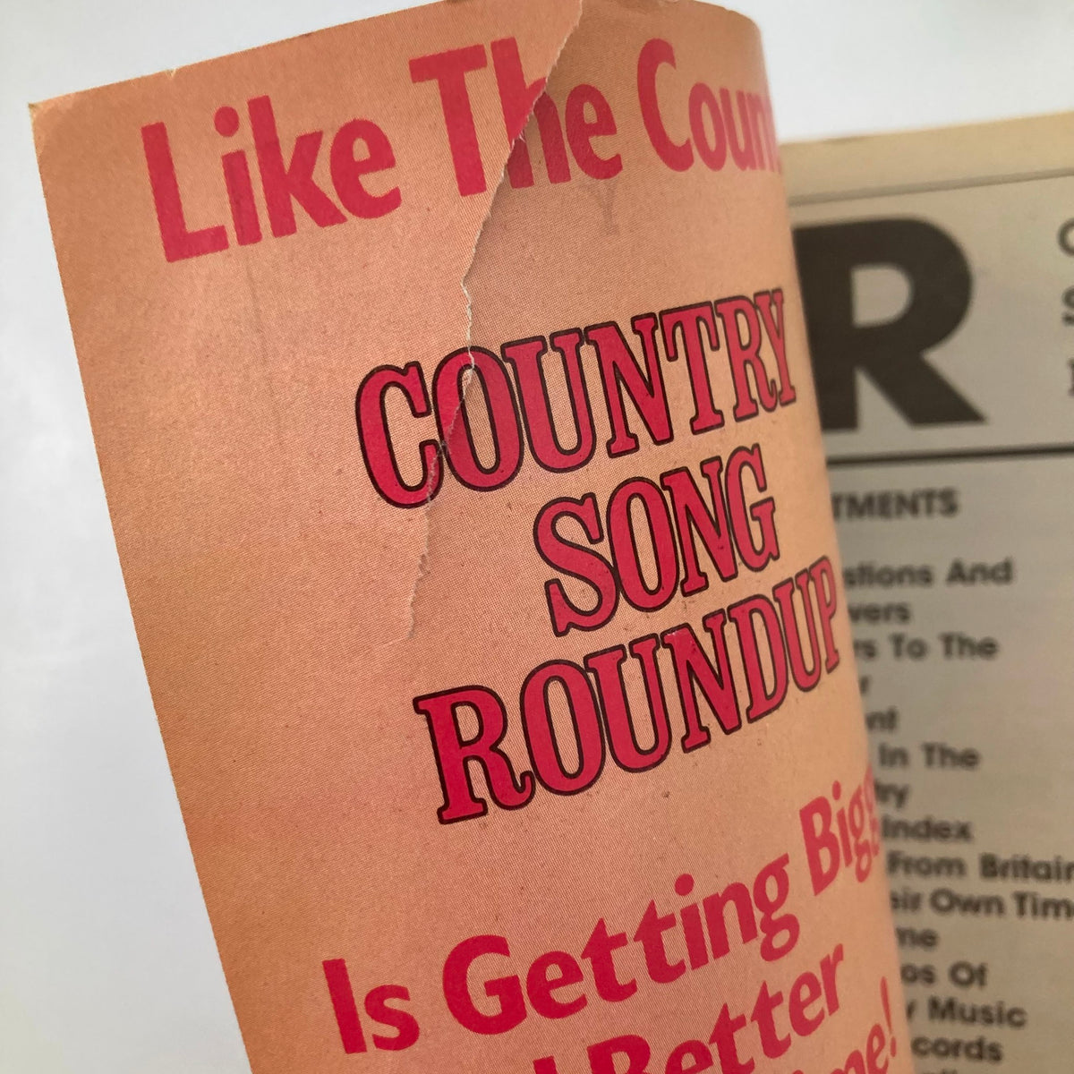 Inside view of the VTG Country Song Roundup Magazine December 1984, highlighting the magazine's title and graphics, indicative of 1980s country music culture.