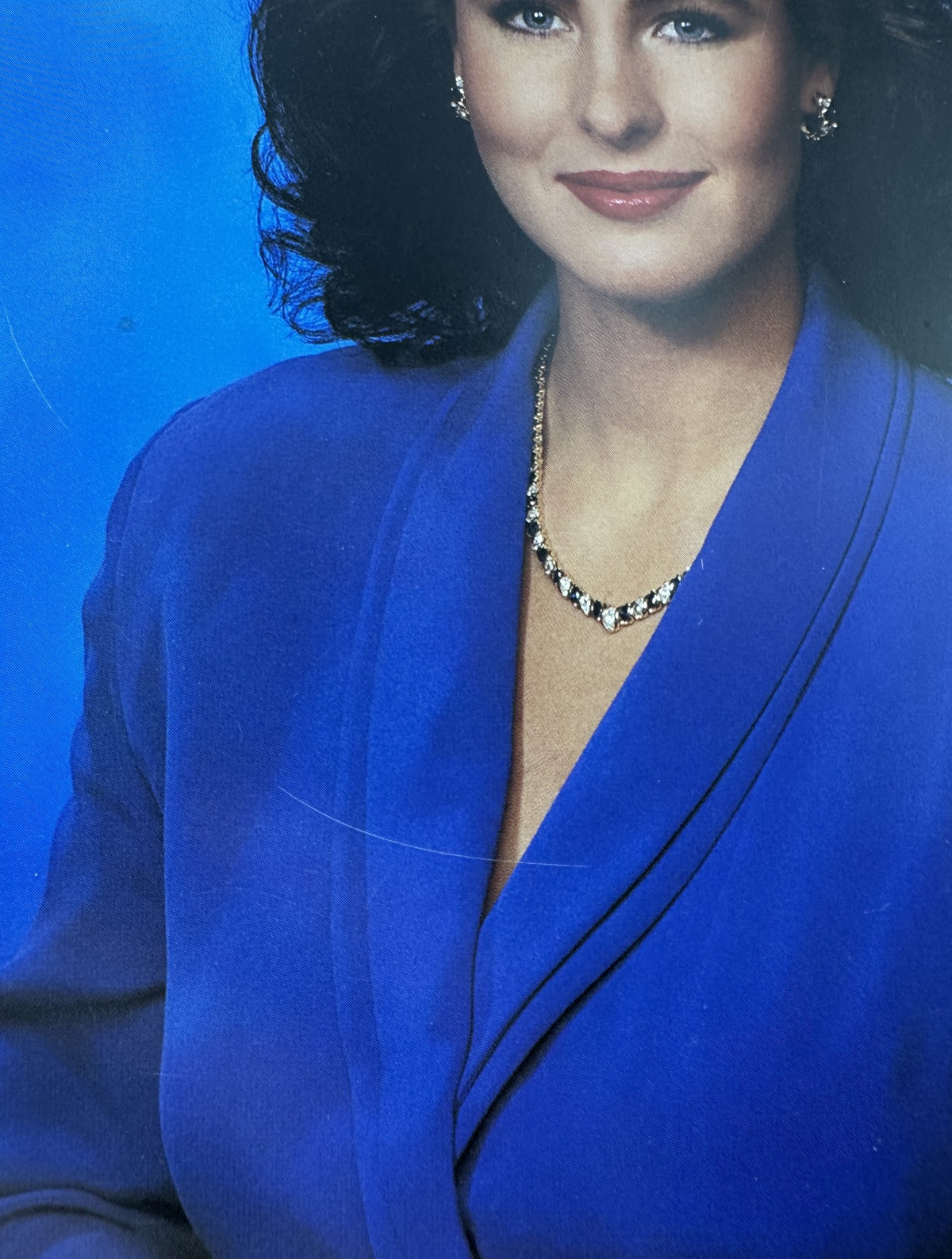 Close-up portrait of a woman in a blue blazer featured on the cover of The 1992 Miss America Pageant Magazine Official Program, Heather Whitestone Cover.