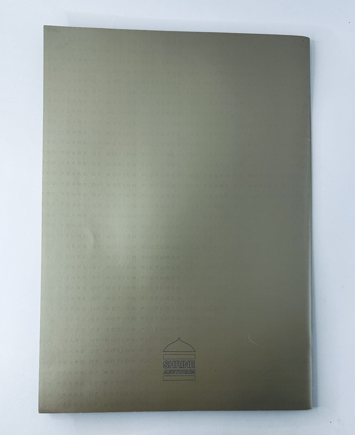 The cover of the Oscar Magazine 63rd Annual Academy Awards 1991 Program, showcasing a sleek design celebrating 100 years of Motion Pictures.