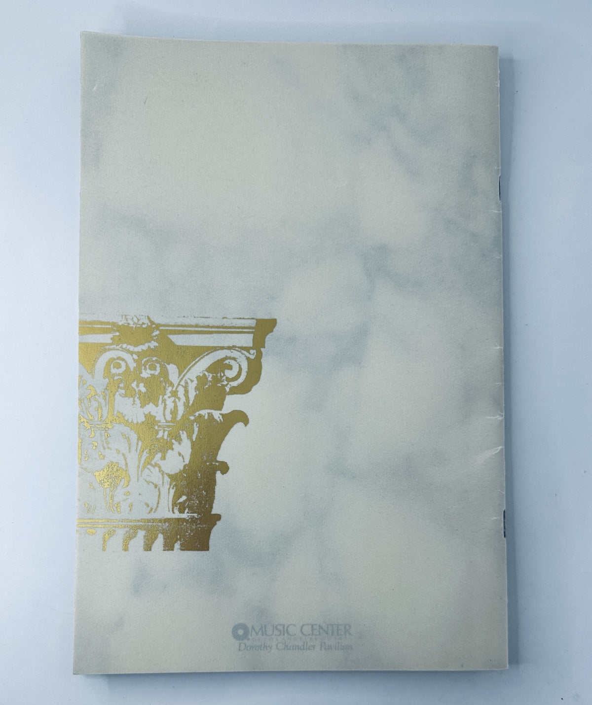 Cover of the Oscar 62nd Annual Academy Awards 1990 Program Magazine featuring embossed marble design.