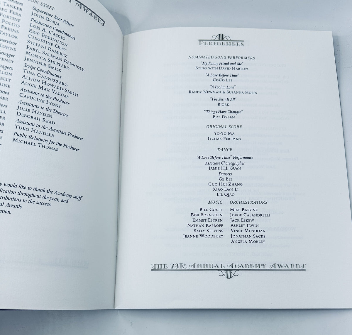 Inside page of the 73rd Annual Academy Awards magazine listing the performers, including nominated song performers like Sting and Björk.