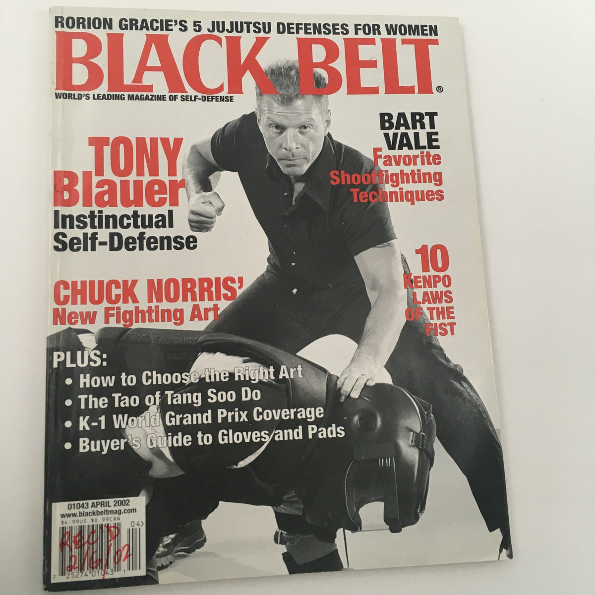 Another view of the cover of Black Belt Magazine April 2002 showcasing Tony Blauer's instinctual self-defense techniques alongside other notable features.
