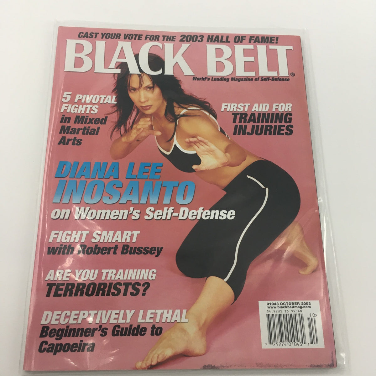 Cover of Black Belt Magazine October 2003 featuring Diana Lee Inosanto, showcasing self-defense techniques, news on training injuries, and martial arts insights.
