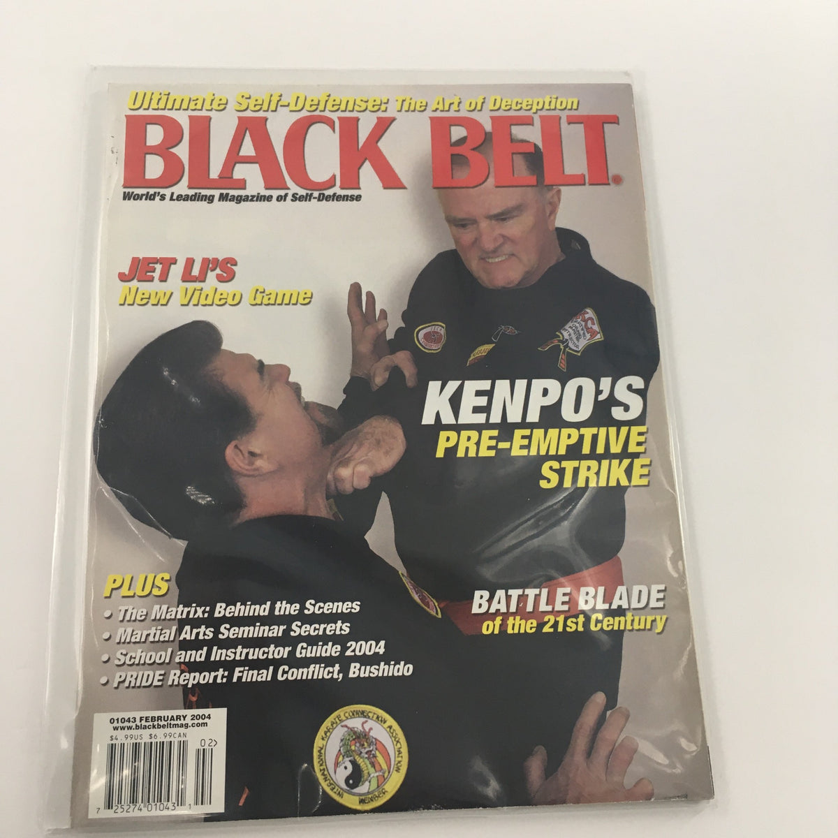 Cover of Black Belt Magazine February 2004 featuring Jet Li's new video game, showcasing a martial arts scene with two practitioners, highlighting Kenpo's pre-emptive strike and articles on self-defense.