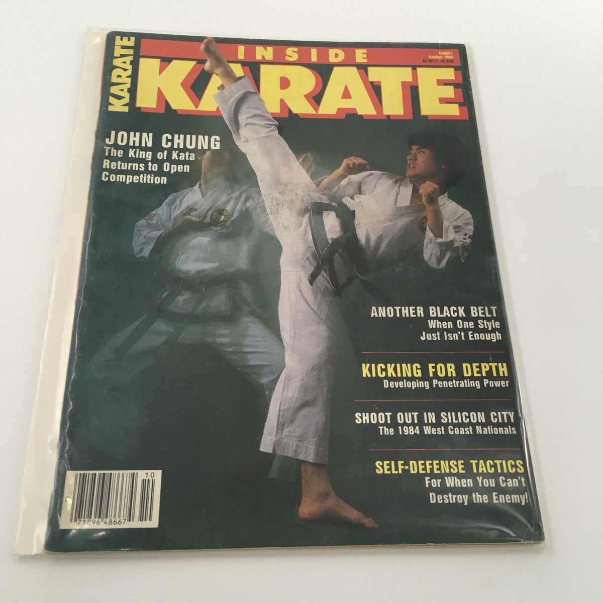 Cover of Inside Karate Magazine, October 1984 edition featuring John Chung, known as The King of Kata, demonstrating a karate kick. Highlights include articles on martial arts techniques and open competition.