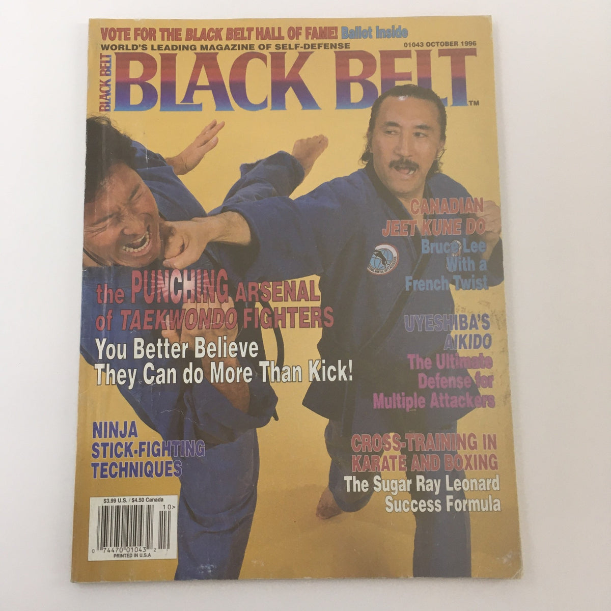 Cover of Black Belt Magazine October 1996 featuring the Sugar Ray Leonard Success Formula. The vibrant magazine cover showcases martial arts themes including Taekwondo and Aikido, highlighting training techniques with engaging visuals. Ideal for collectors and enthusiasts of vintage martial arts publications.