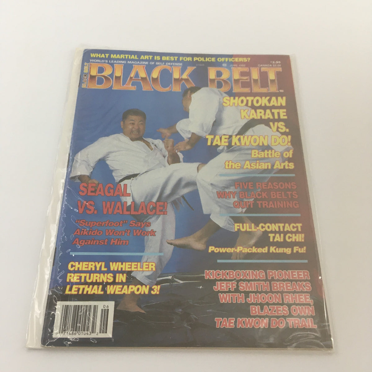 Black Belt Magazine cover from June 1992 featuring Steven Seagal vs Basil Wallace in a martial arts showdown, showcasing Shotokan Karate vs Tae Kwon Do, with details of martial arts insights and techniques.