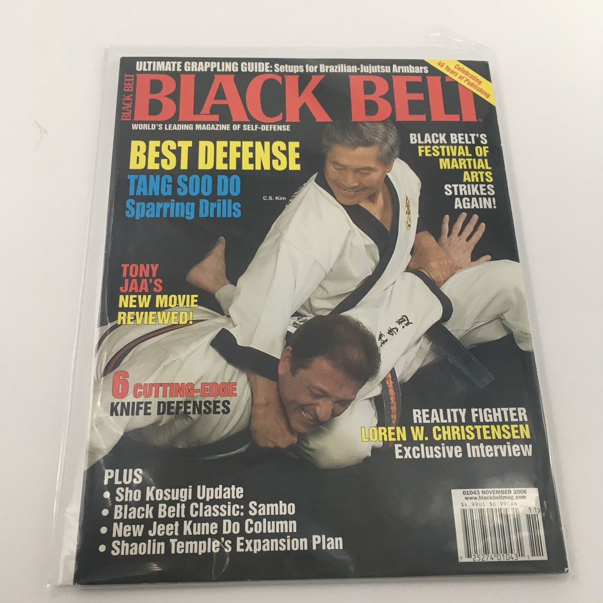 Black Belt Magazine November 2006 cover featuring C.S. Jim and Tony Jaa, highlighting martial arts, best defense techniques, and an exclusive interview with Loren W. Christensen. Newsstand edition in protective plastic.