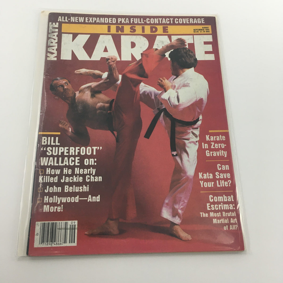 Cover of Inside Karate Magazine September 1985 featuring Bill 'Superfoot' Wallace in a dynamic karate pose, highlighting topics like Jackie Chan and John Belushi.