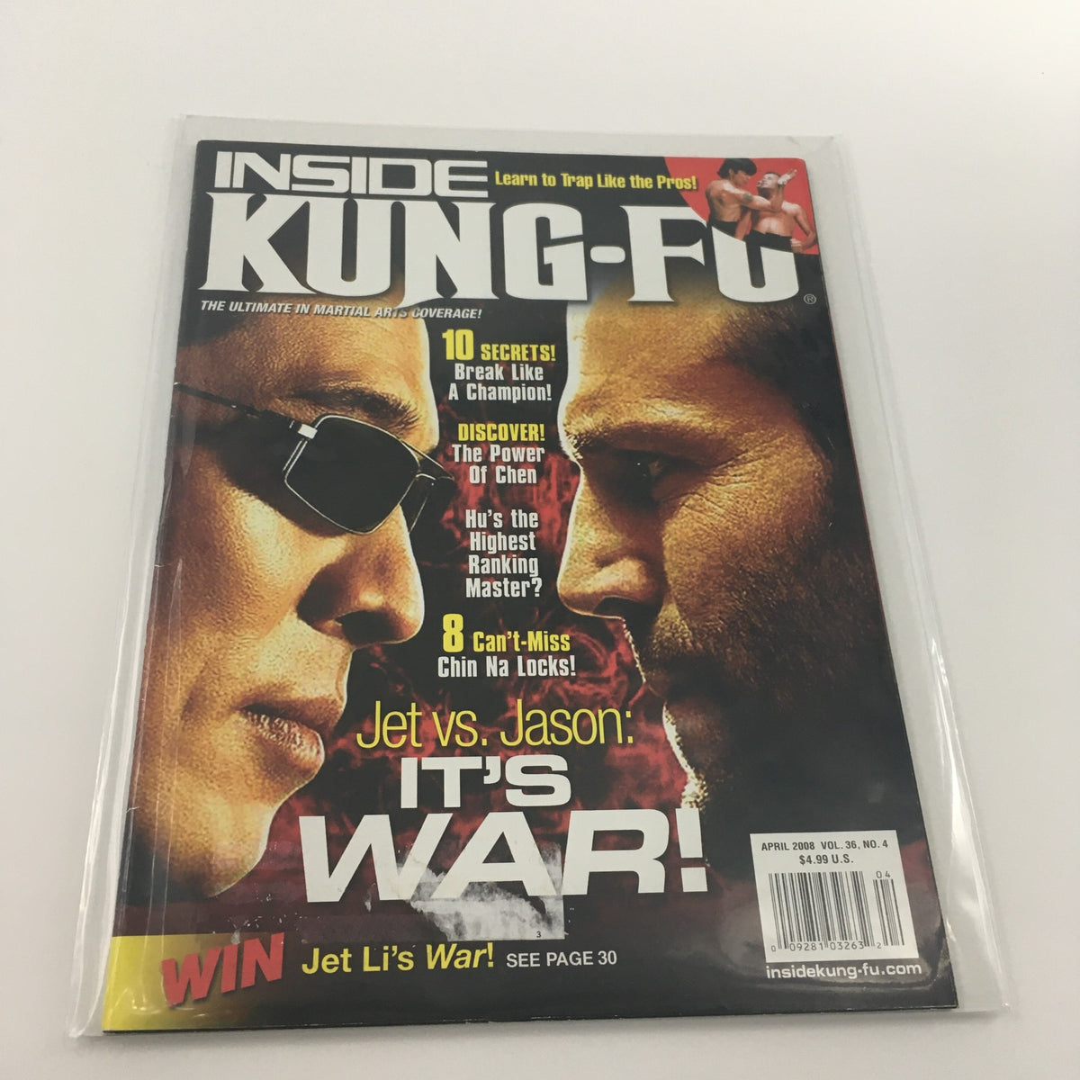 Inside Kung-Fu Magazine April 2008 featuring Jet Li vs Jason Statham on the cover, titled 'It's War!' This magazine showcases martial arts legends and includes insights into their careers.