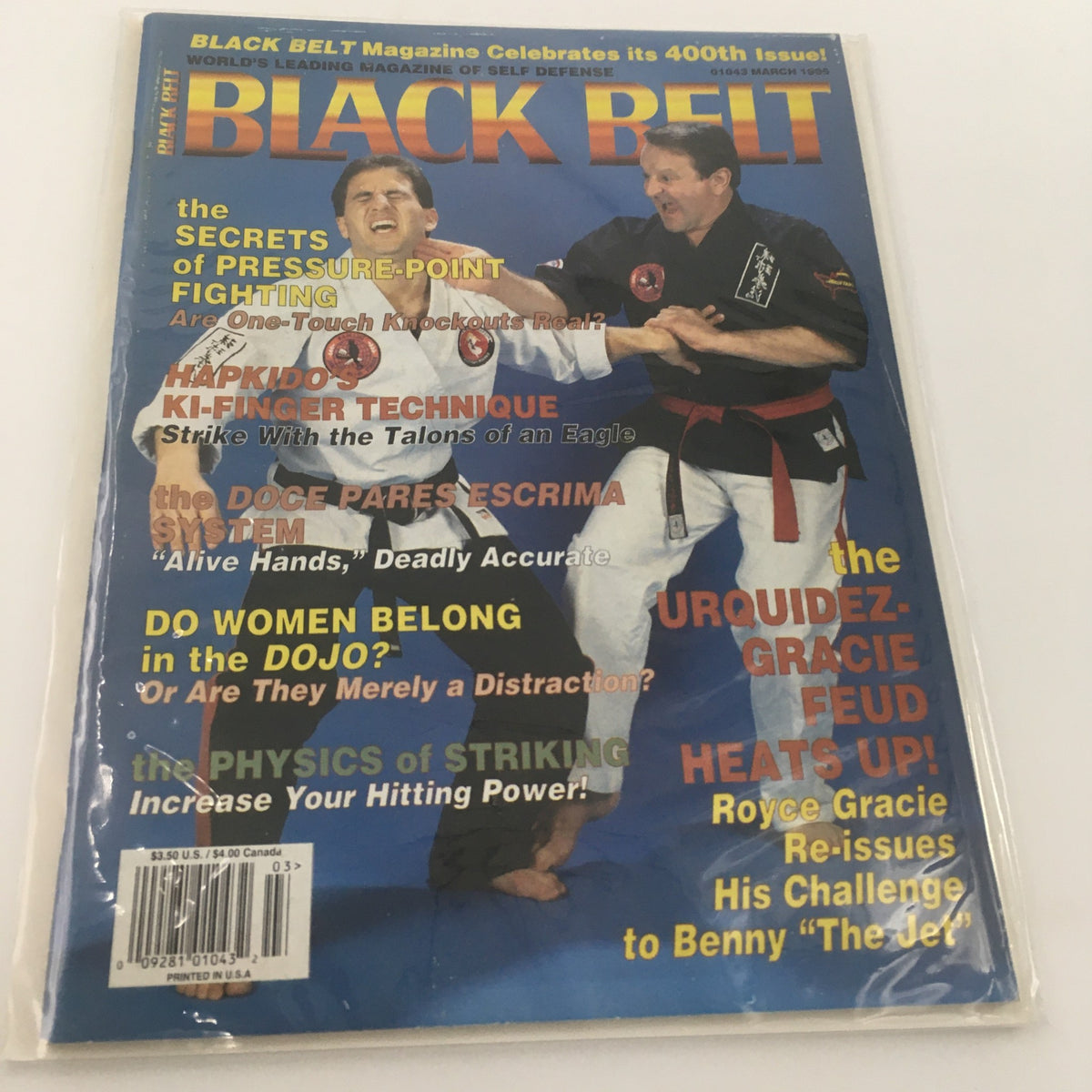Cover of Black Belt Magazine March 1995 featuring Royce Gracie and Benny 'The Jet' Urquidez. The cover highlights articles on pressure-point fighting, hapkido techniques, and the Urquidez-Gracie feud. This newsstand edition showcases martial arts history.