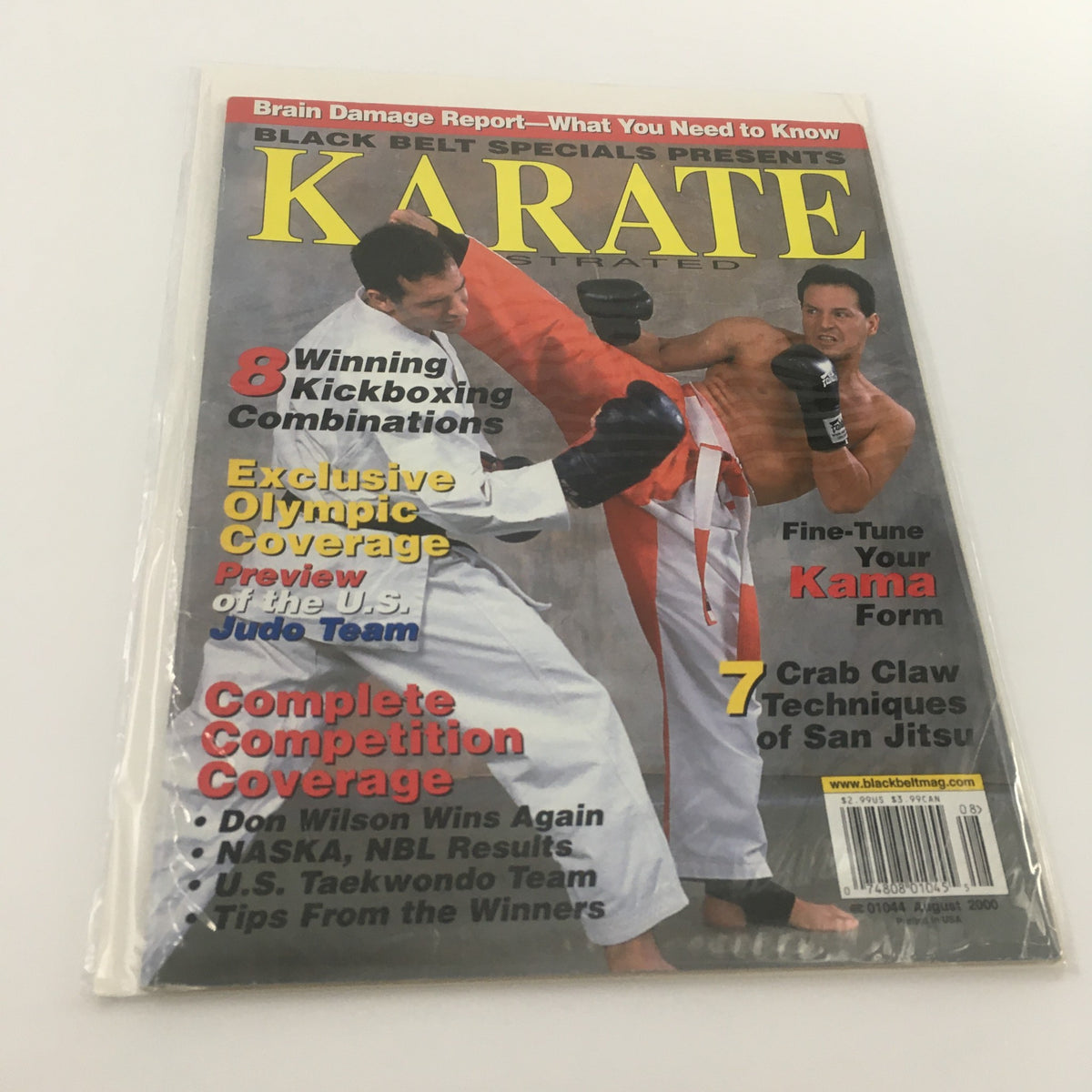 Front cover of Karate Illustrated Magazine August 2000 featuring martial artist Don Wilson, showcasing kickboxing techniques, Olympic coverage, and competition highlights.