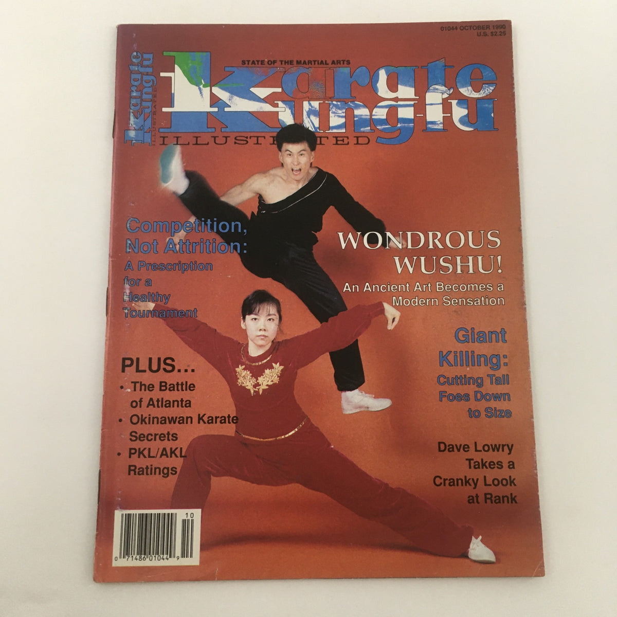 Front cover of Karate Kung Fu Illustrated October 1990 displaying a dynamic image of martial artists, with highlights on 'Giant Killing' and 'Competition, Not Attrition'.