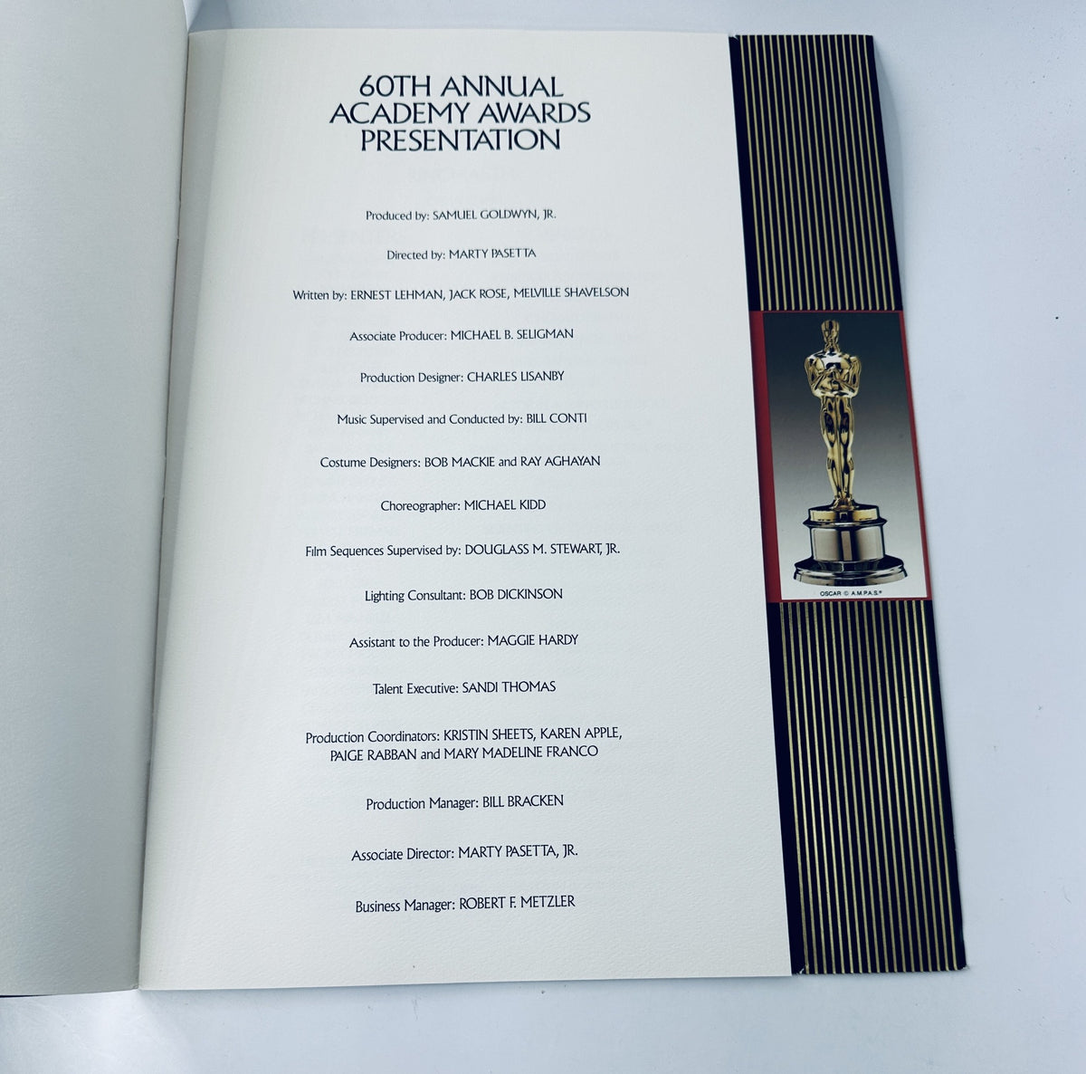 60th Annual Academy Awards Presentation program featuring production details and contributors, including Producer Samuel Goldwyn Jr., Director Marty Pasetta, and more.