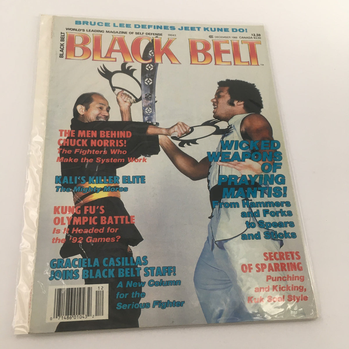 Cover of Black Belt Magazine, December 1988, featuring Bruce Lee with a martial arts weapon, headline reads 'Bruce Lee Defines Jeet Kune Do', showcasing various martial arts topics and cultural icons.
