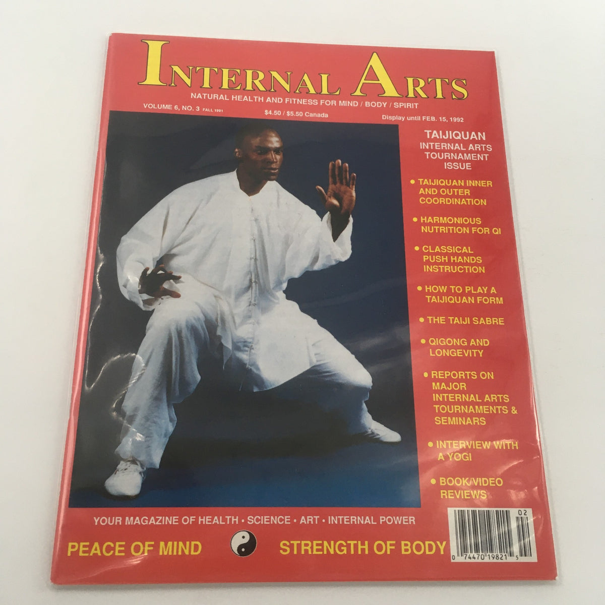 Cover of Internal Arts Magazine Fall 1991 featuring Taiji Sabre and an interview with a yogi, showcasing martial arts techniques and health topics in vibrant red and white design.