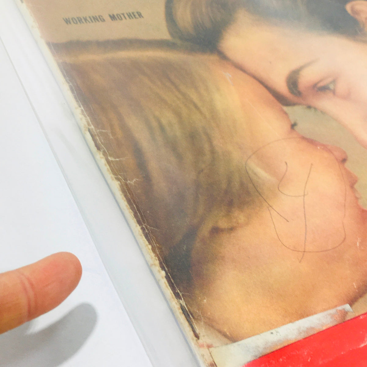 Side view of the front cover of VTG Life Magazine December 24, 1956, emphasizing the special issue on The American Woman and Working Mother with visible wear.