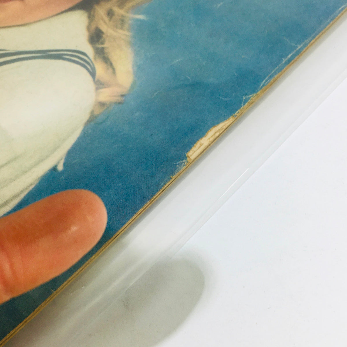 Close-up view of the vintage Life Magazine cover of Hayley Mills, June 13, 1960 - A Pert and Perfect Pollyanna, highlighting details and edges of the magazine.
