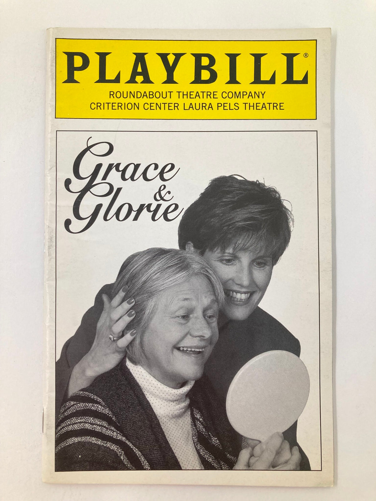 1996 Playbill for Grace & Glorie at the Criterion Center Laura Pels Theatre featuring a black and white image of two women, one smiling and holding a mirror.