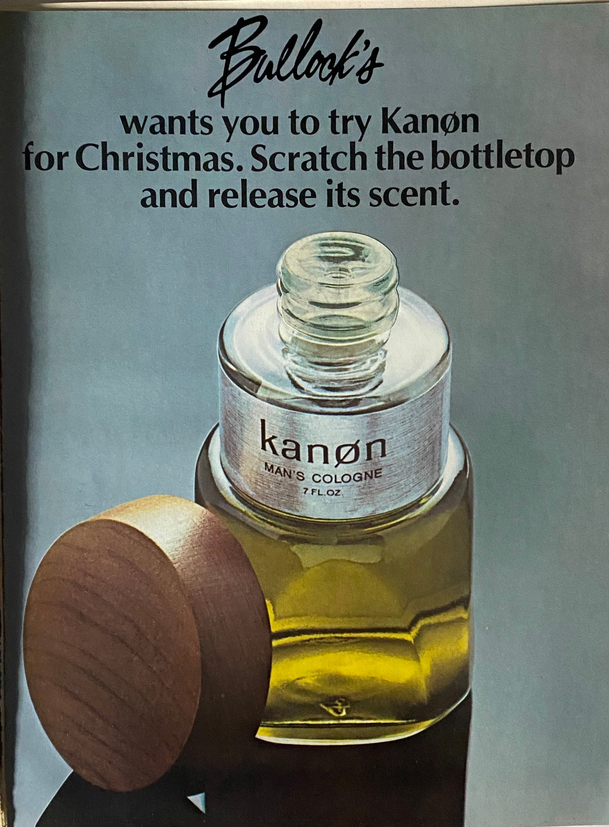 Esquire Magazine December 1972 advertisement for Kanøn Man's Cologne featured on a blue background, promoting a Christmas scent to try.