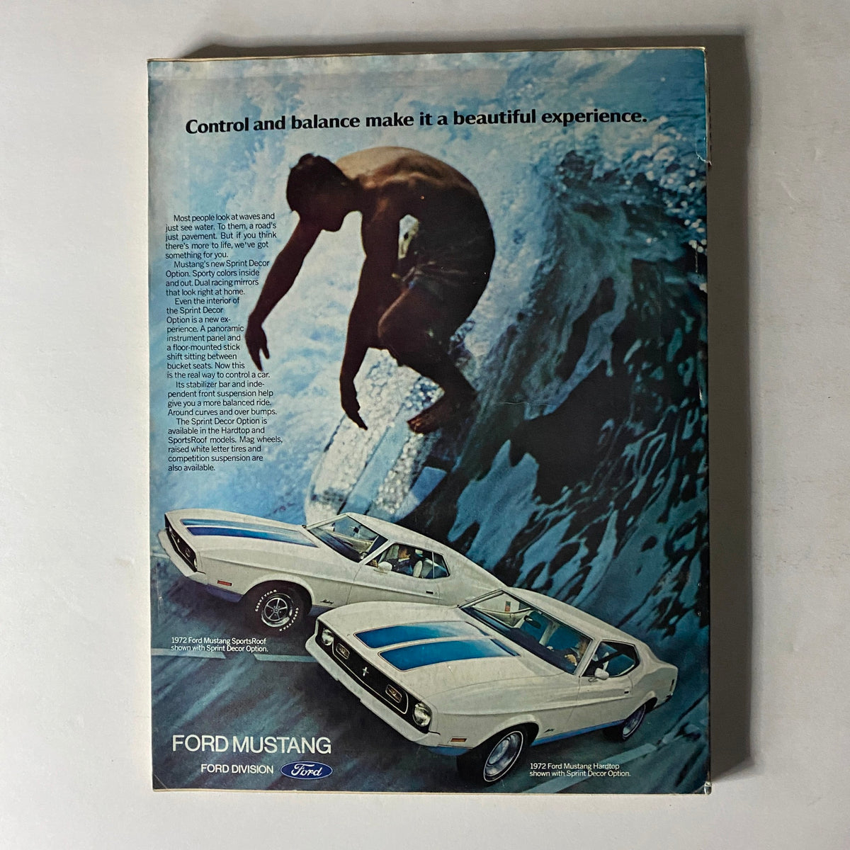 Back cover of Esquire Magazine April 1972 showcasing a Ford Mustang advertisement with an image of a surfer, emphasizing the magazine's vintage automotive content.