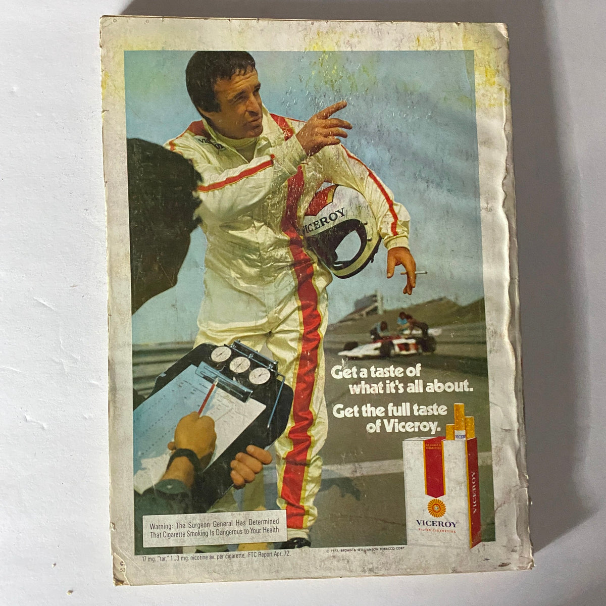Esquire Magazine November 1972 advertisement for Viceroy cigarettes, displaying a race car driver gesturing and promoting the brand with the caption about experiencing the full taste.