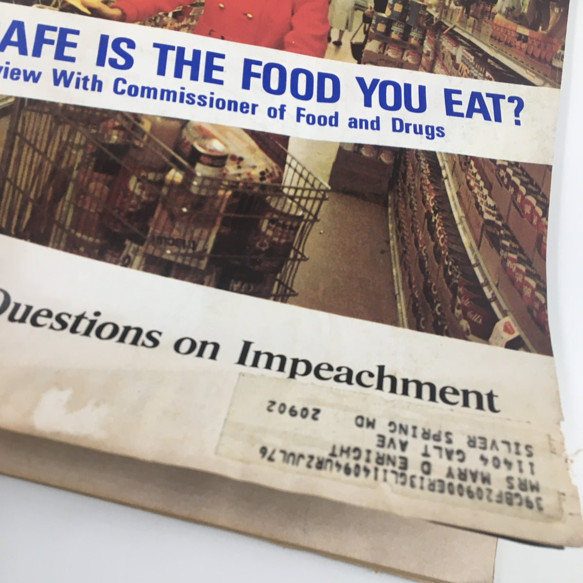 Close-up of the cover of US News & World Report Magazine April 8 1974 displaying the title 'How Safe is The Food You Eat?' and details about an interview with the Commissioner of Food and Drugs.