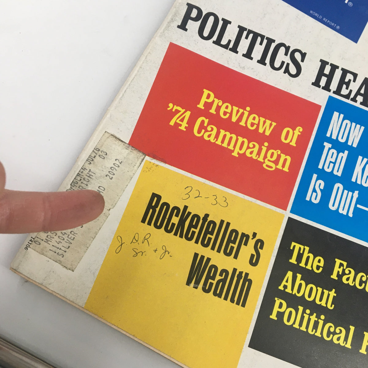 Close-up of US News & World Report Magazine October 7 1974 cover highlighting sections including 'Preview of 74 Campaign' and 'Rockefeller's Wealth' with a visible label and handwritten notes.