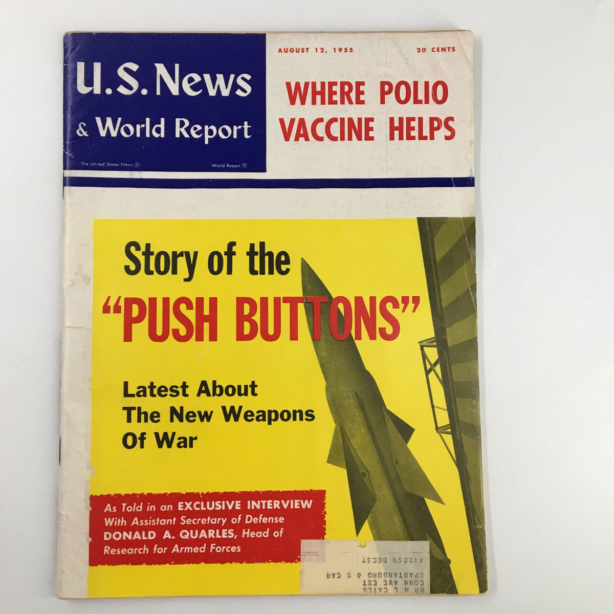Cover of US News & World Report Magazine August 12, 1955 featuring the story 'Push Buttons' discussing new weapons of war and including a bold illustration of a missile.