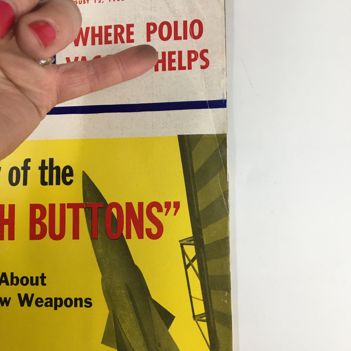 Close-up view of the US News & World Report Magazine cover from August 12, 1955 showing the headline 'Story of the Push Buttons' and associated imagery.