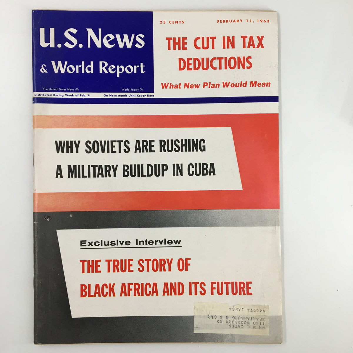 Cover of US News & World Report Magazine from February 11, 1963, featuring the headline 'The Cut in Tax Deductions' along with articles on military buildup in Cuba and an exclusive interview about Black Africa.