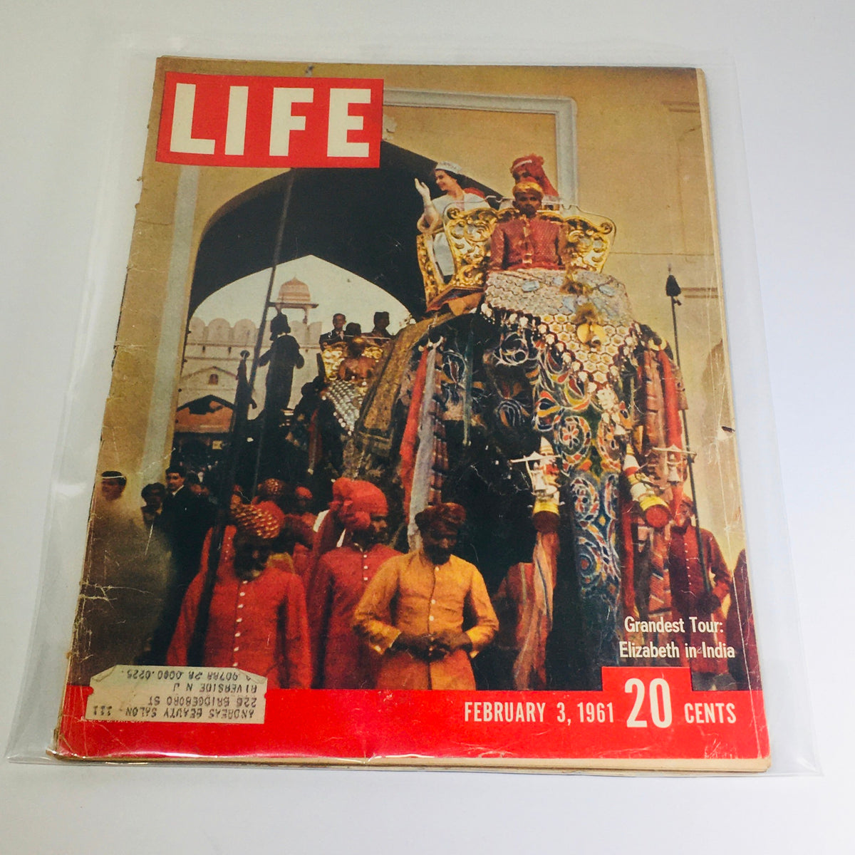 Cover of VTG Life Magazine dated February 3, 1961, featuring the article 'Grandest Tour: Elizabeth in India,' showcasing a vibrant image of Queen Elizabeth II on an elaborately decorated elephant during her India tour.
