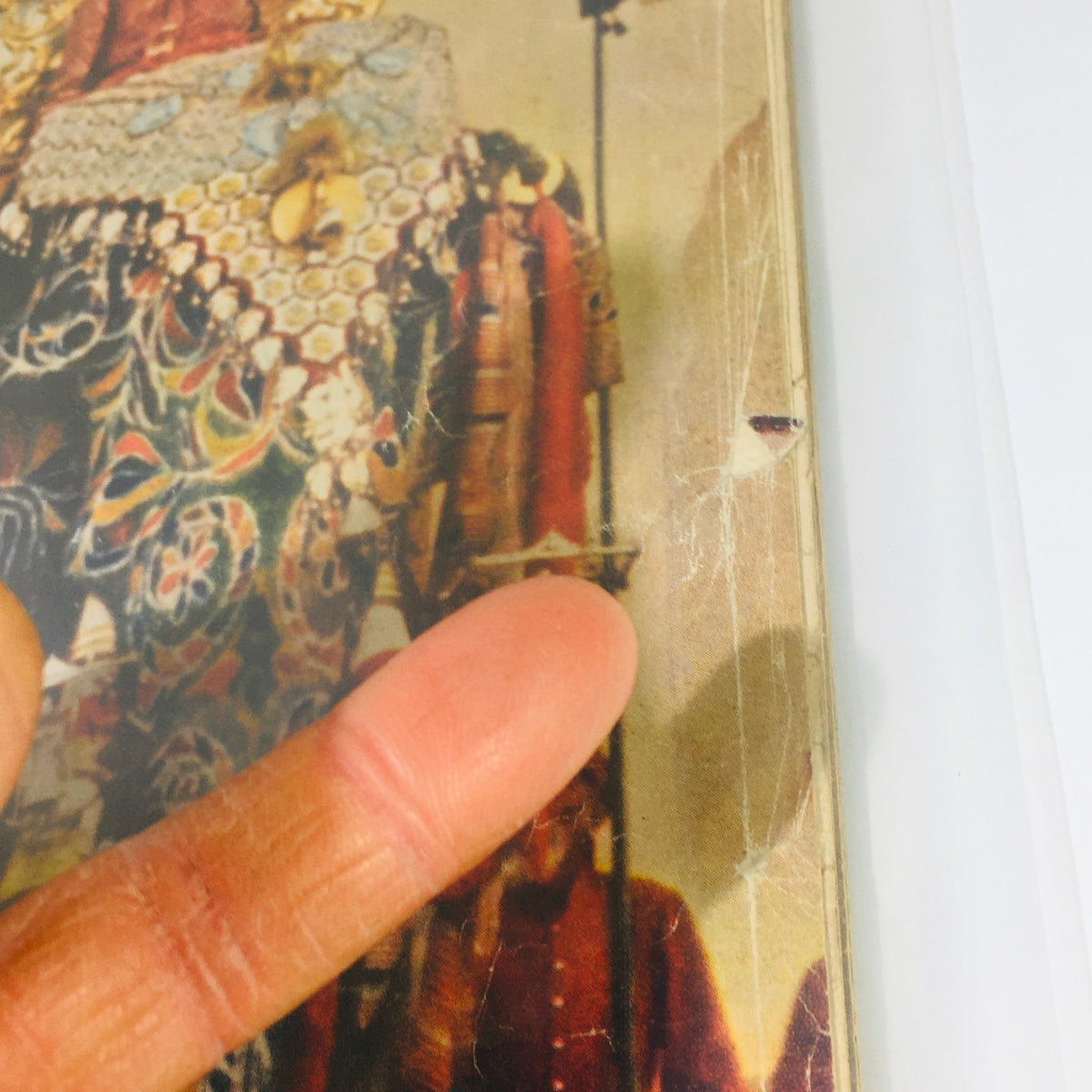 Close-up view of the cover of VTG Life Magazine from February 3, 1961, detailing the 'Grandest Tour: Elizabeth in India,' with visible wear and tear highlighting its vintage condition.