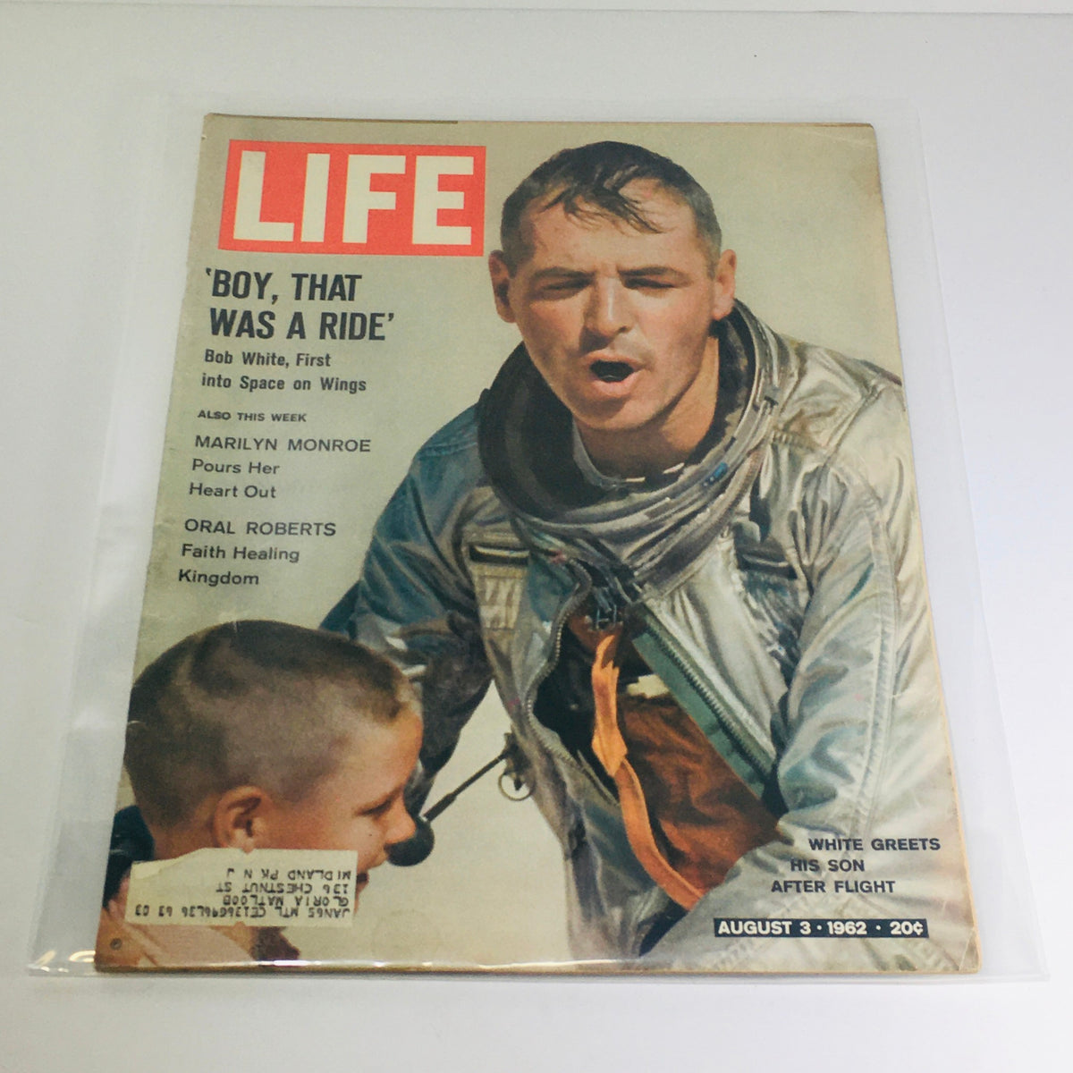 Vintage Life Magazine from August 3, 1962, featuring Bob White greeting his son after his first flight, showcasing aviation excitement in the early 1960s.