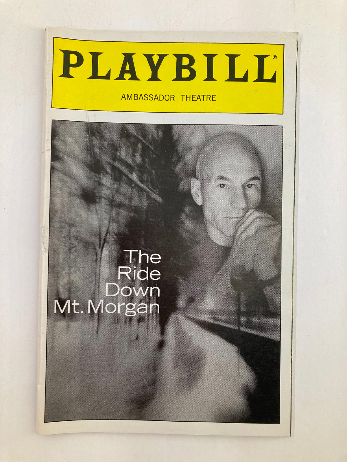 2000 Playbill from the Ambassador Theatre featuring Patrick Stewart in The Ride Down Mt. Morgan, showcasing a striking cover design with a black and white image of the actor.