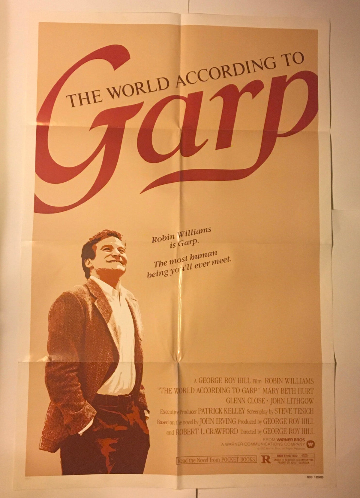 1982 The World According to Garp 41" x 27" Original Movie Poster displaying Robin Williams as Garp, with a prominent tagline highlighting the film's unique blend of comedy and drama.