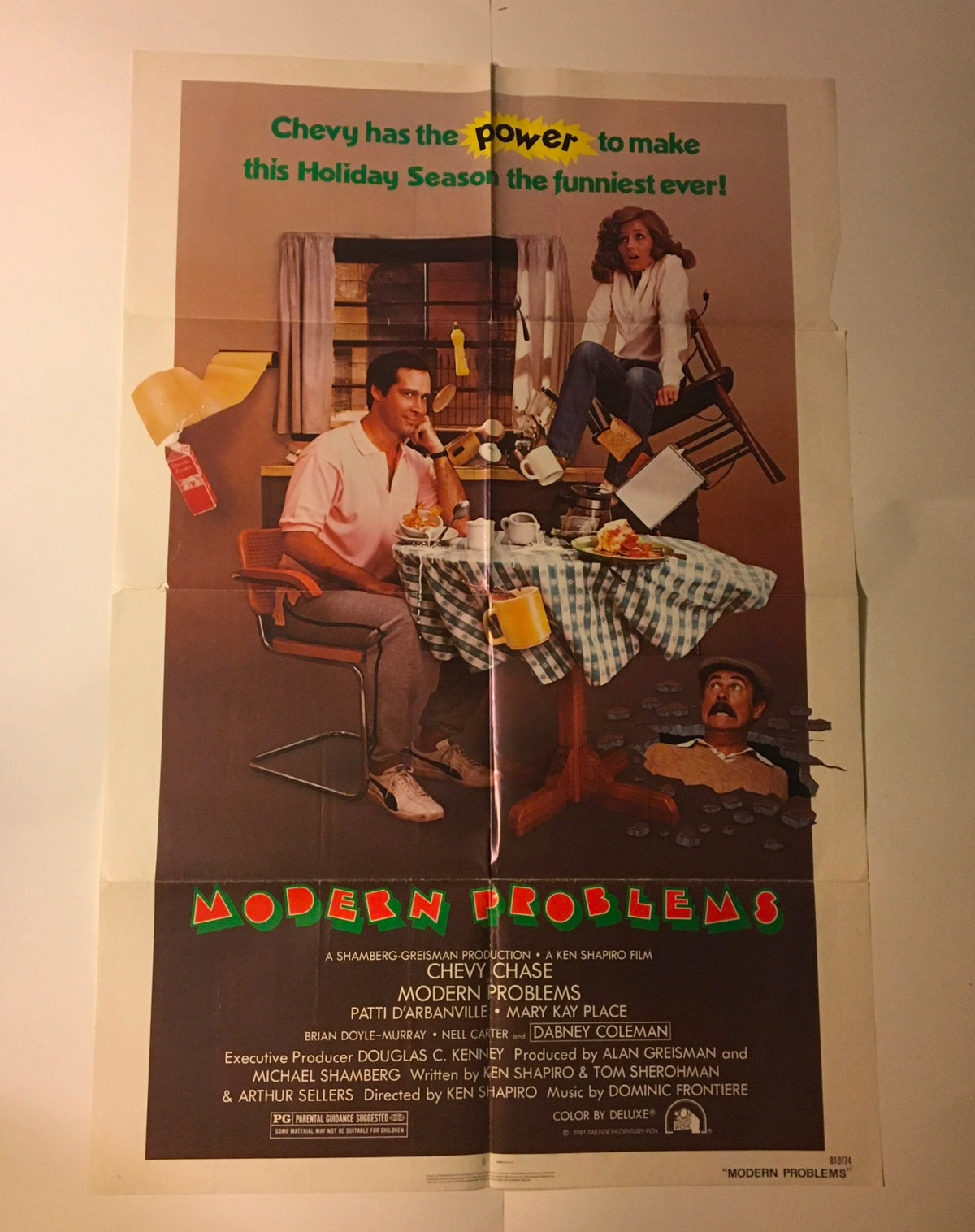 1981 Modern Problems 41" x 27" Original Movie Poster showcasing Chevy Chase in a humorous setting with a holiday theme.