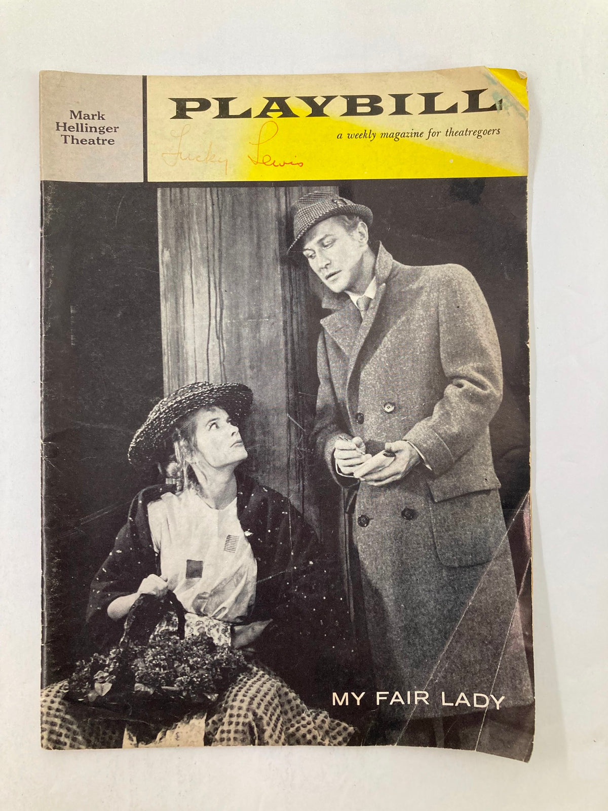 1959 Playbill from Mark Hellinger Theatre featuring Sally Ann Howes in My Fair Lady, showcasing a black and white image of the cast with visible wear including creases and a signature.