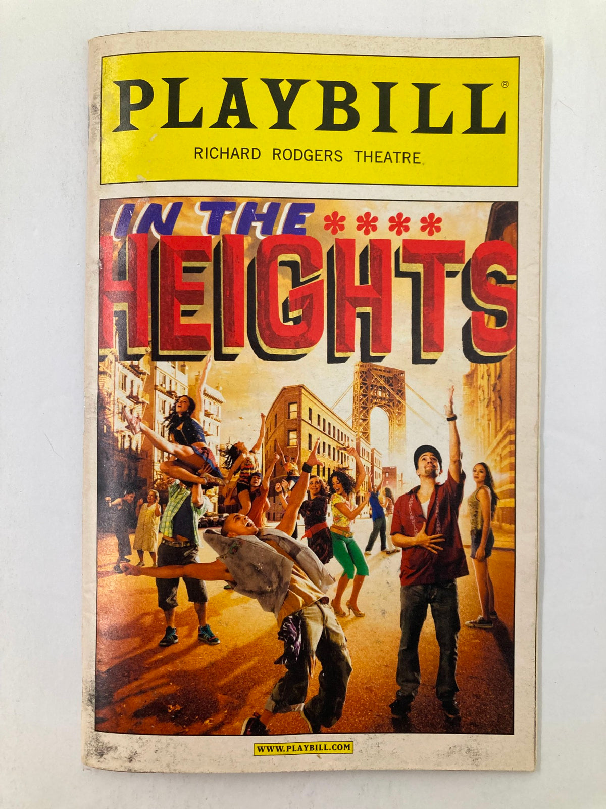 July 2008 Playbill from the Richard Rodgers Theatre featuring the musical In The Heights, showcasing vibrant artwork depicting scenes and characters from the show.