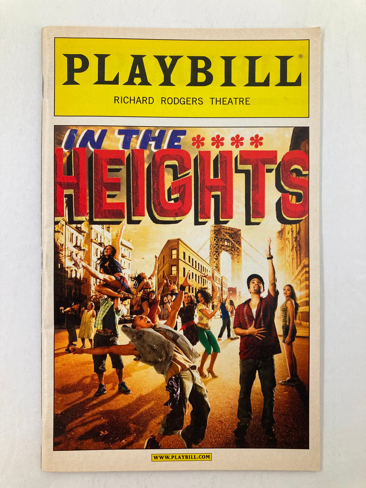 August 2009 Playbill featuring the vibrant cover of 'In The Heights' at Richard Rodgers Theatre, showcasing the lively atmosphere of the musical.