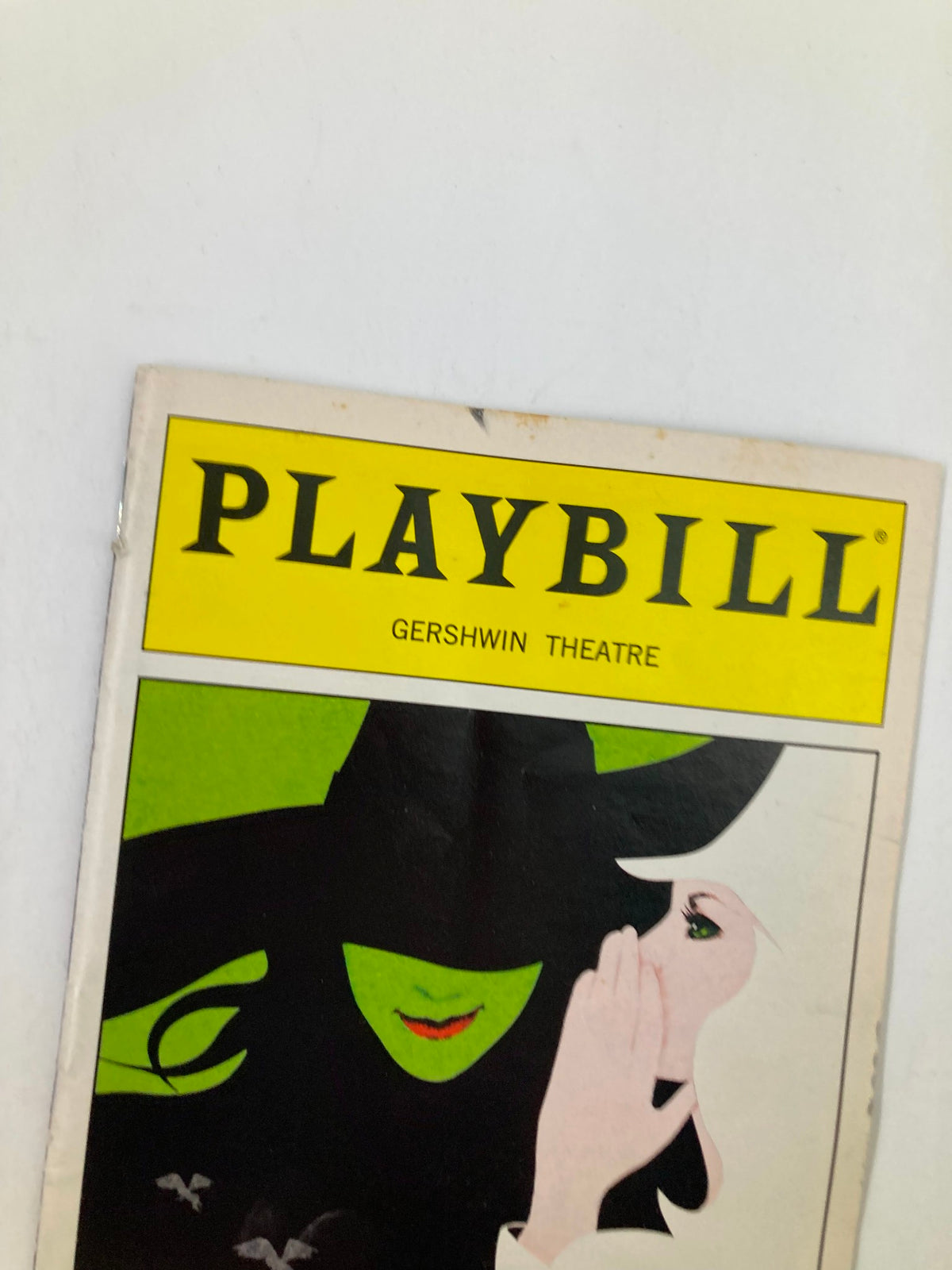 Close-up view of the 2004 Vol 120 #1 Playbill for Wicked at the Gershwin Theatre, highlighting the title and artwork details.