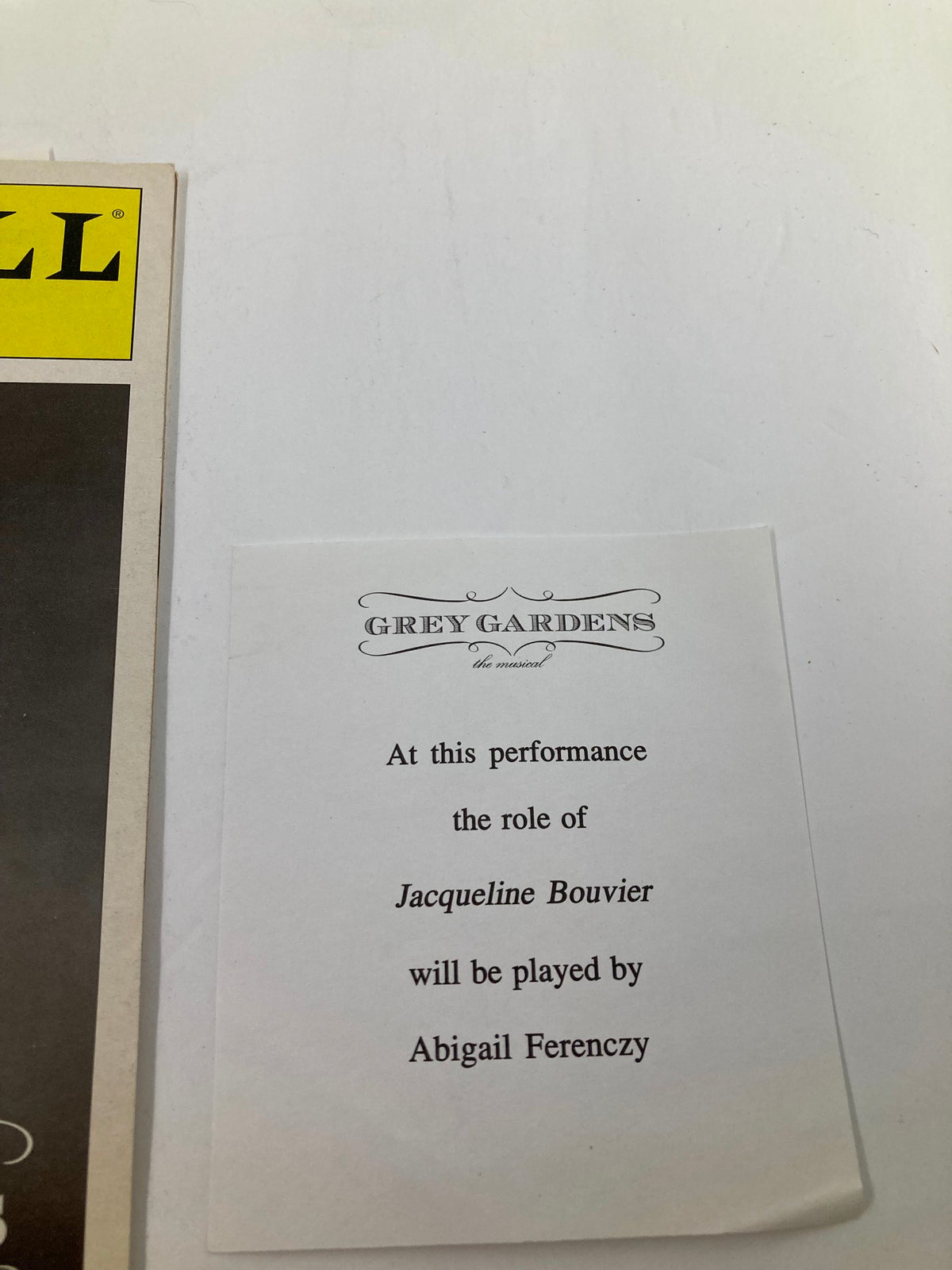 An insert from the 2007 Playbill for Grey Gardens, indicating the role of Jacqueline Bouvier played by Abigail Ferenczy.