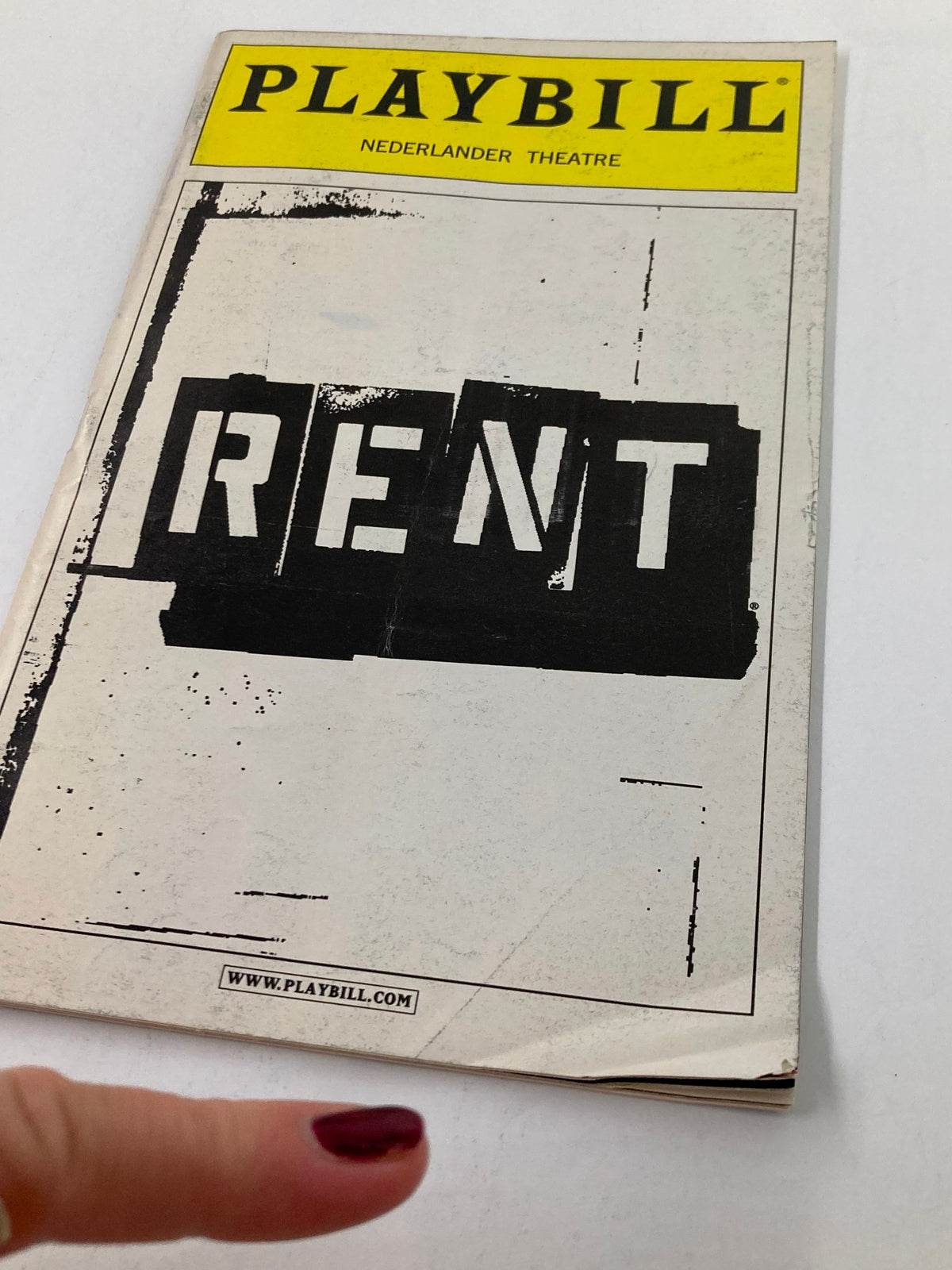2003 Playbill Nederlander Theatre featuring the Playbill cover for Rent, showcasing the iconic logo and title in a striking black and white design.