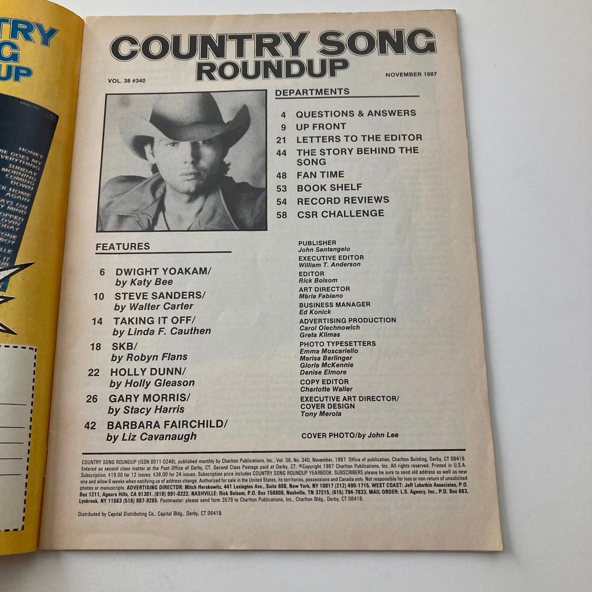 Inside page of the VTG Country Song Roundup Magazine November 1987, showcasing features on Dwight Yoakam, Holly Dunn, and articles about country music, with a focus on the magazine's layout and content.