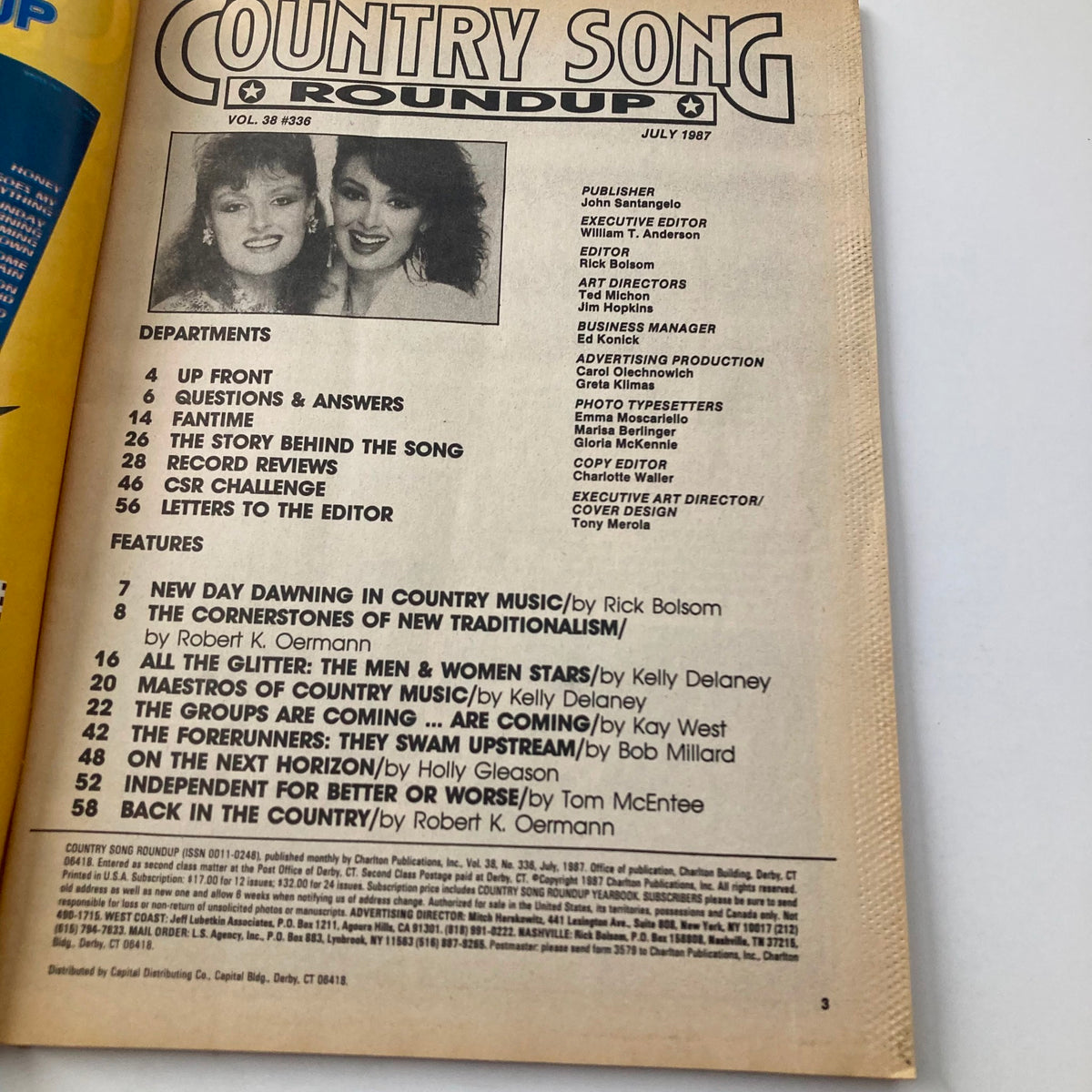 Inside page of Country Song Roundup Magazine July 1987, displaying the table of contents with details about articles featuring The Judds and Ricky Skaggs.