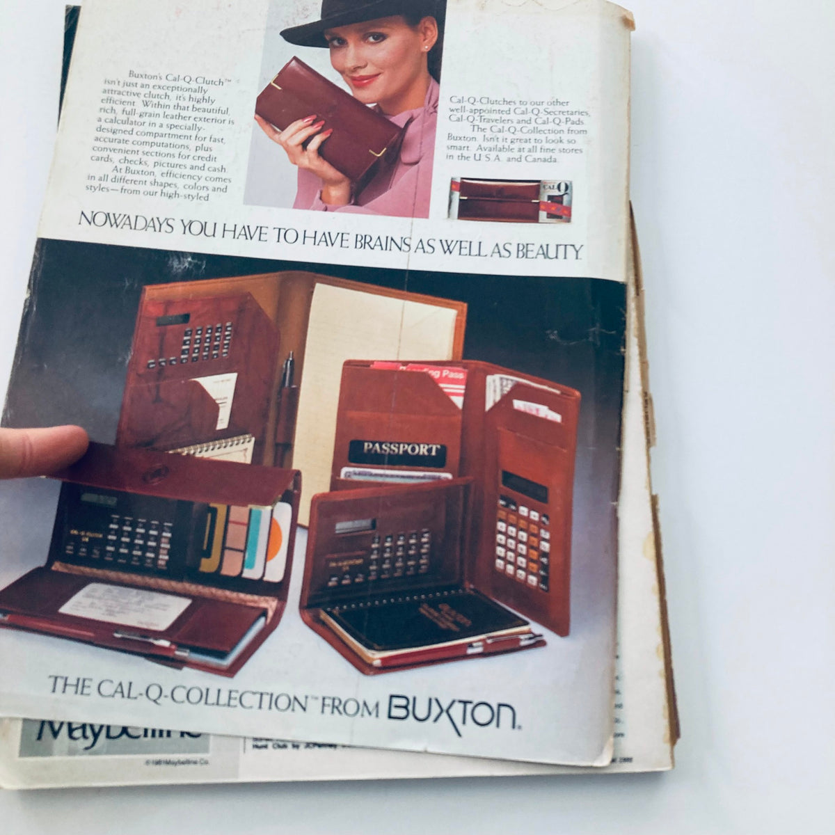Advertisement page from Seventeen Magazine August 1982 displaying Buxton's Cal-Q Clutch, highlighting the blend of brains and beauty for teens.