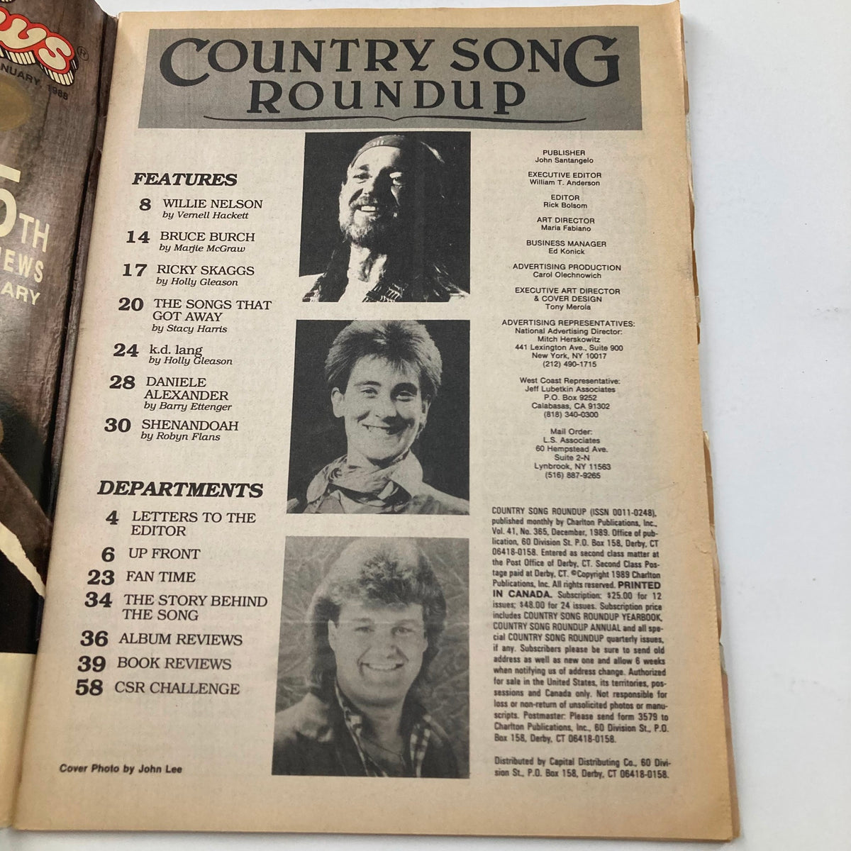 Interior page of the December 1989 VTG Country Song Roundup Magazine, highlighting featured artists including Willie Nelson, k.d. lang, and Ricky Skaggs with details about articles and contributions.