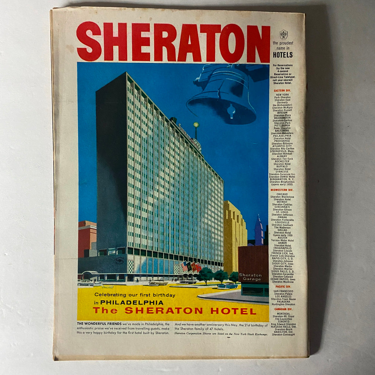 Sheraton Hotel advertisement celebrating its first birthday in Philadelphia, featured in a vintage magazine, highlighting the iconic building and vibrant design.