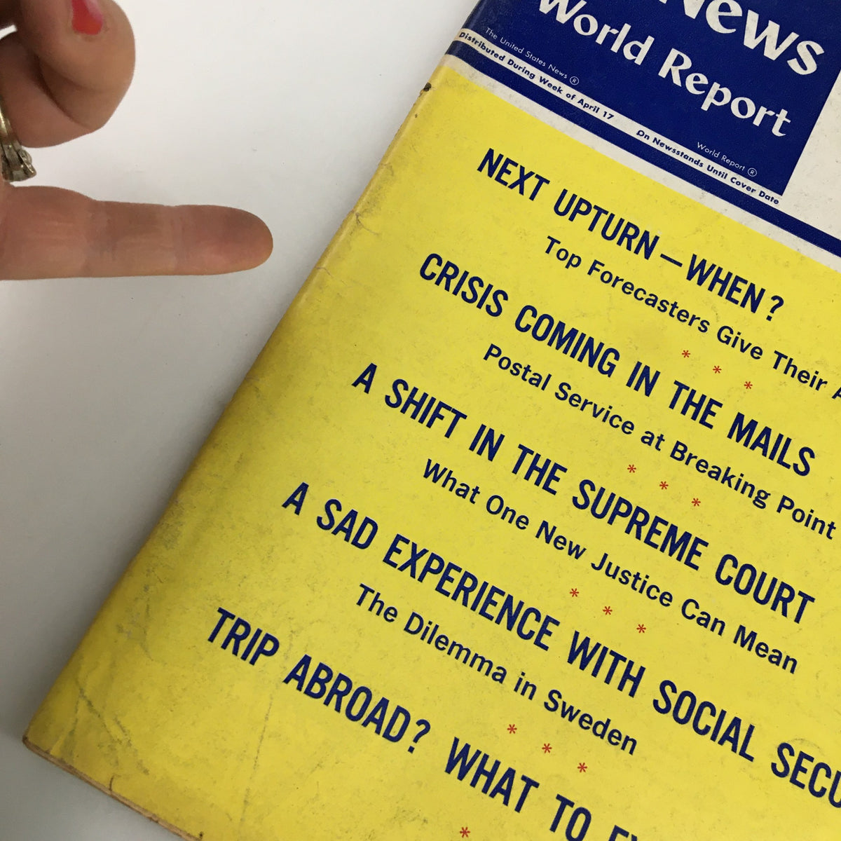 Close-up view of the US News & World Report Magazine, April 24, 1967, highlighting article titles like 'Next Upturn – When?' and 'Crisis Coming in the Mails'.