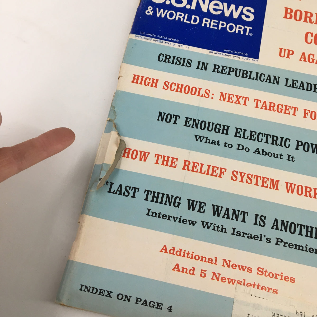 US News & World Report Magazine from September 22, 1969 featuring articles on economic issues and political crises, with visible wear indicating its vintage condition.